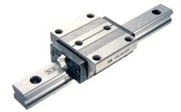 The NB slide guide SGL is a profile linear guide rail system utilizing the recirculating motion of ball elements along four rows of raceway grooves. It can be used in various applications due to its compactness and high load capacity.